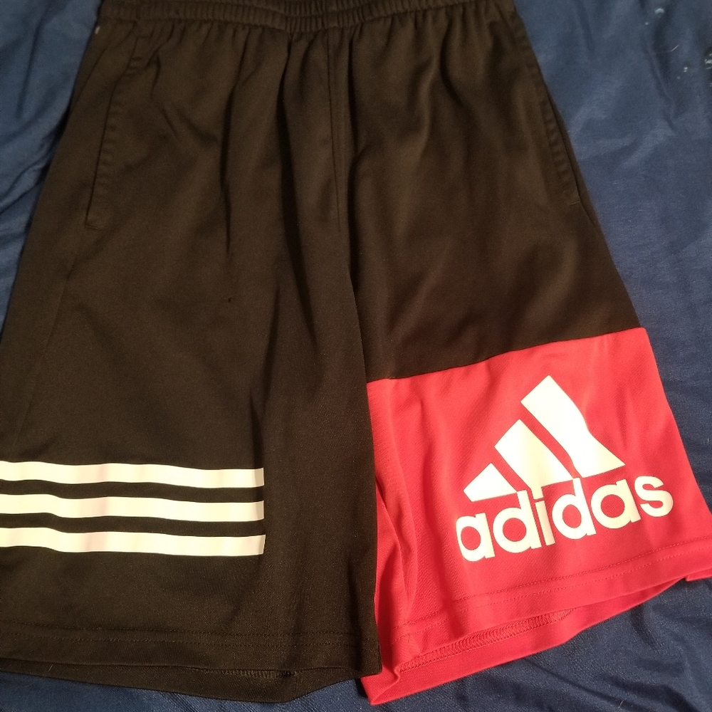 Boy's Adidas, black, red and white shorts.